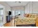 Bright bedroom with bay window, vaulted ceiling, and hardwood floors at 20837 N 23Rd Pl, Phoenix, AZ 85024