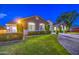 Well-maintained single-story home showcasing tidy landscaping, a paved driveway, and a garage at 22406 S 173Rd Way, Gilbert, AZ 85298