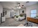 Bright and airy main bedroom featuring a seating area and ample natural light at 22406 S 173Rd Way, Gilbert, AZ 85298