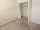 Bright bedroom featuring a closet and neutral carpet at 2423 E Flower St, Phoenix, AZ 85016