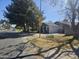 A single-story home with a desert landscape visible in the front yard and a street view at 2423 E Flower St, Phoenix, AZ 85016