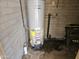 Water heater with energy guide, situated on a floor of brick at 2423 E Flower St, Phoenix, AZ 85016