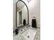 Close up of bathroom vanity, showing granite countertop, sink, chrome faucet and modern mirror at 25821 S Hollygreen Dr, Sun Lakes, AZ 85248