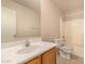 Bathroom showing a vanity, mirror, toilet and tub with shower at 25845 W Lynne Ln, Buckeye, AZ 85326