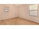 Bedroom showing a window bringing in natural light at 25845 W Lynne Ln, Buckeye, AZ 85326