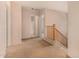 Upstairs hallway featuring carpet and three hallways to other areas at 25845 W Lynne Ln, Buckeye, AZ 85326