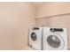 Laundry room featuring a washer and dryer at 25845 W Lynne Ln, Buckeye, AZ 85326