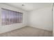 Empty bedroom with large window for natural light at 26632 S Branchwood Ct, Sun Lakes, AZ 85248