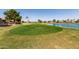 Expansive golf course with pond views offering a tranquil and scenic environment at 26632 S Branchwood Ct, Sun Lakes, AZ 85248