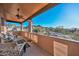 Relaxing balcony with comfortable seating and scenic views, offering a tranquil outdoor retreat at 28503 N 104Th Way, Scottsdale, AZ 85262