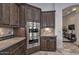 Detailed view of kitchen cabinetry and stainless steel appliances at 28503 N 104Th Way, Scottsdale, AZ 85262