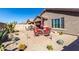 Beautifully landscaped backyard with a seating area on a paver patio at 29986 N Jillian Dr, San Tan Valley, AZ 85143