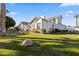 Beautiful home showcasing lush green lawn, mature trees, and a well-maintained exterior at 302 W Stella Ln, Phoenix, AZ 85013