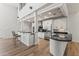 Modern kitchen with stainless steel appliances, granite countertops, and custom cabinetry at 302 W Stella Ln, Phoenix, AZ 85013