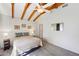 Charming main bedroom features exposed beam ceiling, ceiling fan, and soft natural light at 32 E 14Th St, Tempe, AZ 85281