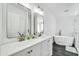 Elegant bathroom featuring double sinks, soaking tub and walk-in shower at 38203 W Willetta St, Tonopah, AZ 85354