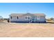 Charming single-story home featuring a covered entryway and well-maintained facade at 38203 W Willetta St, Tonopah, AZ 85354