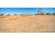 Expansive flat land lot featuring desert landscaping and distant mountain views at 38203 W Willetta St, Tonopah, AZ 85354