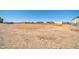 Expansive flat land lot featuring desert landscaping and distant mountain views at 38203 W Willetta St, Tonopah, AZ 85354