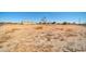 Expansive flat land lot featuring desert landscaping and distant mountain views at 38203 W Willetta St, Tonopah, AZ 85354