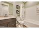 Bathroom with a sink, toilet, tub with shower, and a neutral color palette at 38233 N Stillmeadow Rd, San Tan Valley, AZ 85140