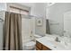 Traditional bathroom with a shower-tub combo, framed art, and a single sink vanity at 40265 N Acadia Ct, Anthem, AZ 85086