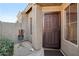 Inviting front entry featuring a security door and well-maintained landscaping at 40265 N Acadia Ct, Anthem, AZ 85086