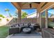 Spacious covered patio featuring a cozy seating area perfect for outdoor entertaining at 4502 E Meadow Dr, Phoenix, AZ 85032