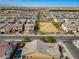 Overhead view of a neighborhood featuring a green field and soccer goal across the street at 4708 S 117Th Ave, Avondale, AZ 85323