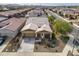 Aerial view of a single-Gathering house with a two-car garage and a landscaped front yard in a neighborhood with sidewalks at 4708 S 117Th Ave, Avondale, AZ 85323