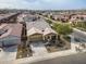 High aerial view of a single-Gathering home featuring desert landscaping and a two-car garage, set in a sprawling suburban community at 4708 S 117Th Ave, Avondale, AZ 85323