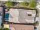 Aerial view of home featuring a backyard pool and spa at 4708 S 117Th Ave, Avondale, AZ 85323