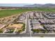 A beautiful aerial view of a Gathering-friendly community park with playground equipment and picnic area at 4708 S 117Th Ave, Avondale, AZ 85323