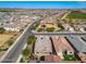 Neighborhood aerial shot highlighting the proximity to a green field, playground, and surrounding streets at 4708 S 117Th Ave, Avondale, AZ 85323