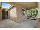 Covered patio area includes decorative stone columns, railing, and a 'Welcome' sign by the front door at 4708 S 117Th Ave, Avondale, AZ 85323