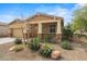 Single-story house showing desert landscaping, a covered porch, and an attached two-car garage at 4708 S 117Th Ave, Avondale, AZ 85323