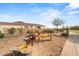 Community playground with various play structures and a sandy play area for children at 4708 S 117Th Ave, Avondale, AZ 85323