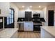 Updated kitchen featuring stainless steel appliances and white cabinets at 5106 N 17Th Ave # 3, Phoenix, AZ 85015