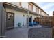 View of a backyard patio with seating, plants, and a privacy fence at 5106 N 17Th Ave # 3, Phoenix, AZ 85015