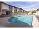 Community pool nestled among residential buildings, offering a refreshing escape at 5106 N 17Th Ave # 3, Phoenix, AZ 85015