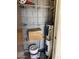 A storage area with gray shelving unit and a Whirlpool water heater at 5114 W Joan De Arc Ave, Glendale, AZ 85304