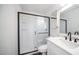 This bathroom features a modern stand-up shower with a sliding glass door at 5327 W Saint Moritz Ln, Glendale, AZ 85306