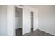 This closet features wood floors and ample hanging storage space for organizing belongings at 5327 W Saint Moritz Ln, Glendale, AZ 85306