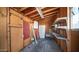 Shed interior with shelves, a refrigerator, and lighting at 5327 W Saint Moritz Ln, Glendale, AZ 85306