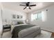 Cozy bedroom with neutral tones, natural light, and minimalist decor at 556 E Manor Dr, Casa Grande, AZ 85122