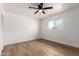 A bedroom space with a ceiling fan and natural light at 556 E Manor Dr, Casa Grande, AZ 85122