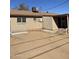 Backyard features a brick fireplace and storage at 6617 W Peck Dr, Glendale, AZ 85301