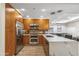 Spacious kitchen featuring stainless steel appliances and wood cabinets at 7127 E Rancho Vista Dr # 2003, Scottsdale, AZ 85251