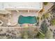 Aerial view of the pool and outdoor living space, surrounded by serene desert landscaping at 7211 E Rising Star Way, Carefree, AZ 85377