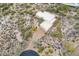 A breathtaking aerial shot showcasing the home's unique architecture and vast desert surroundings at 7211 E Rising Star Way, Carefree, AZ 85377